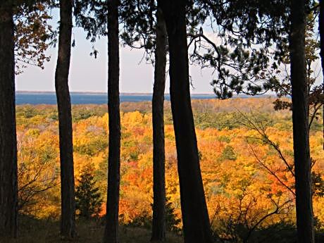 An overlook at Peninsula Park in Door County reveals warm tangerines, ambers and shimmering golds