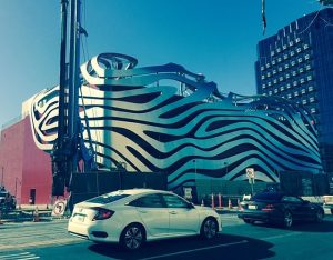 The recently redone Petersen Automotive Museum. A subway system is currently being extended just outside and below the museum.