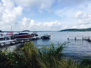 Boats pull up at piers around Geneva Lake. 