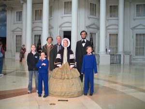 Visitors like to pose with Lincoln's family at the Abraham Lincoln Museum in Springfield